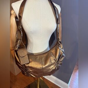 Fashion Vegan Leather hobo style crossbody in metallic gold/bronze color
